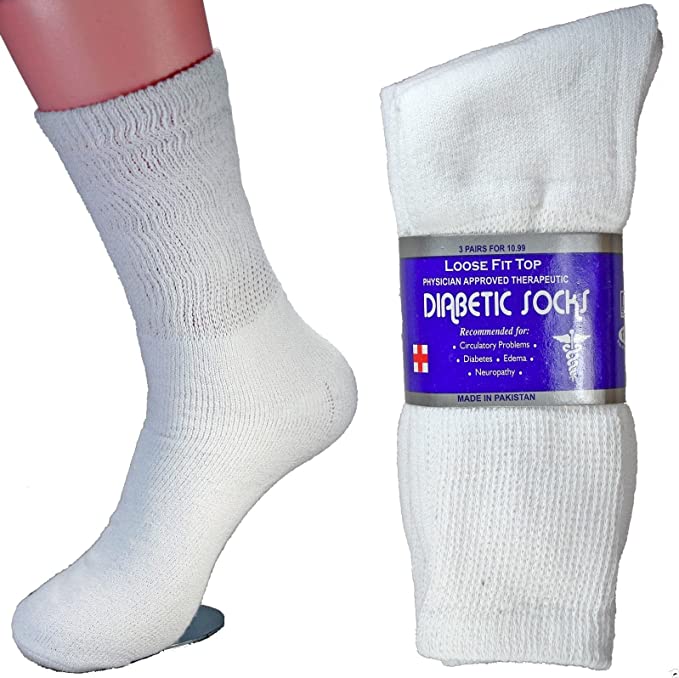 A pair of white diabetic socks displayed on a mannequin foot, alongside a packaged set of the same socks. The packaging features a bold purple label with the text "Loose Fit Top - Physician Approved Therapeutic Diabetic Socks" and lists conditions they are recommended for, such as circulatory problems, diabetes, edema, and neuropathy - Lower Body Dressing After Hip Replacement Surgery